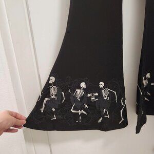 Flare pants with skeleton design size Medium from Killstar